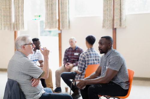 Men chating in a group